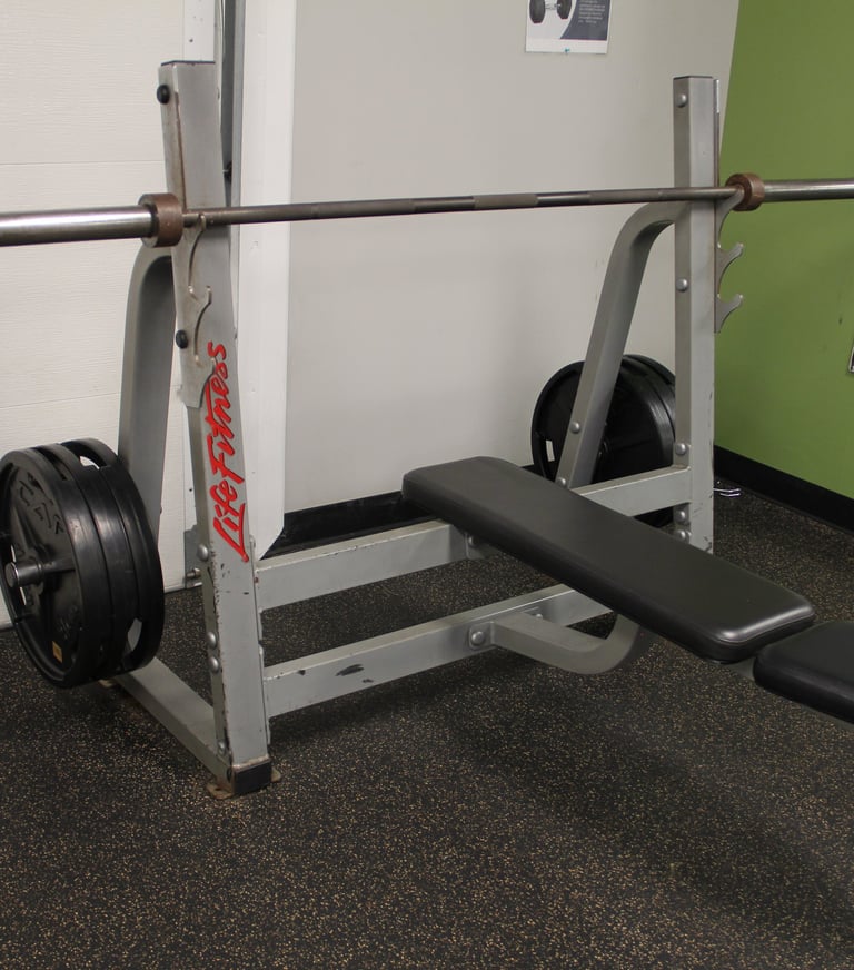 weight bench with barbell