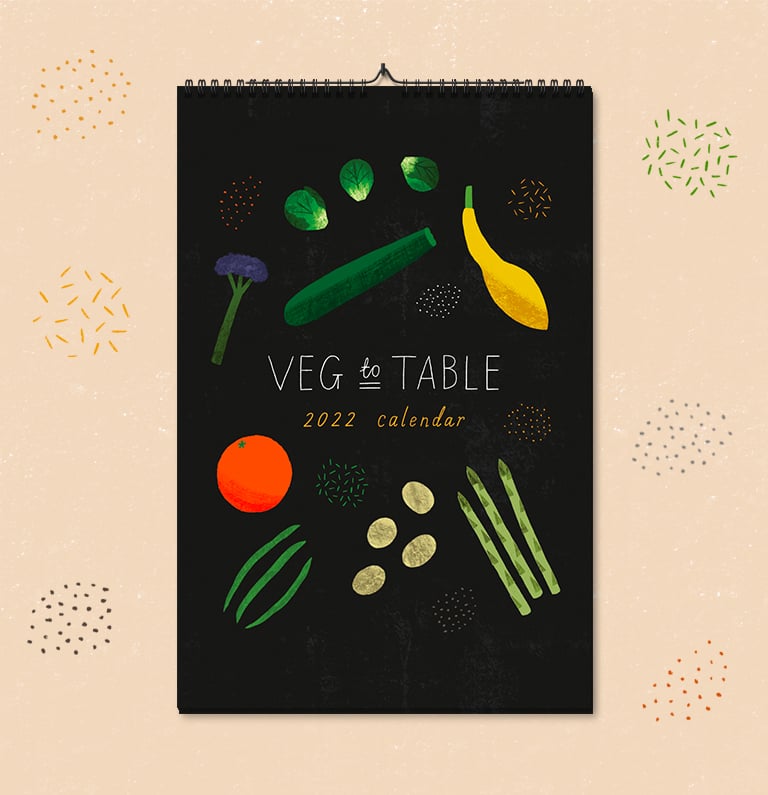 An A4 calendar is mocked up on a patterned background.