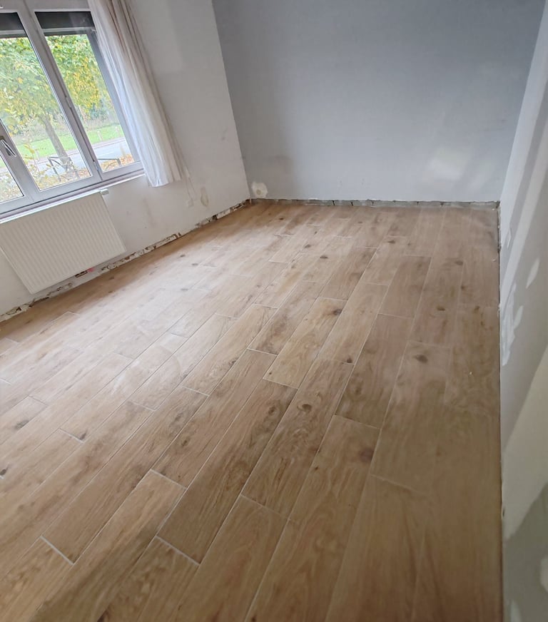 Pose de carrelage dans un garage à Annezin par Carréno