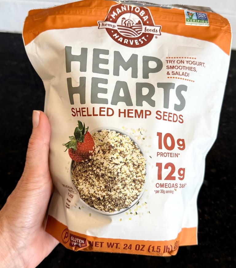 Bag of Manitoba Harvest hemp hearts showing protein and omega content on the front.