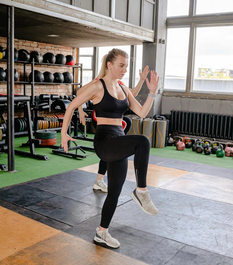 Woman performing a dynamic lunge exercise, demonstrating an active and healthy lifestyle.
