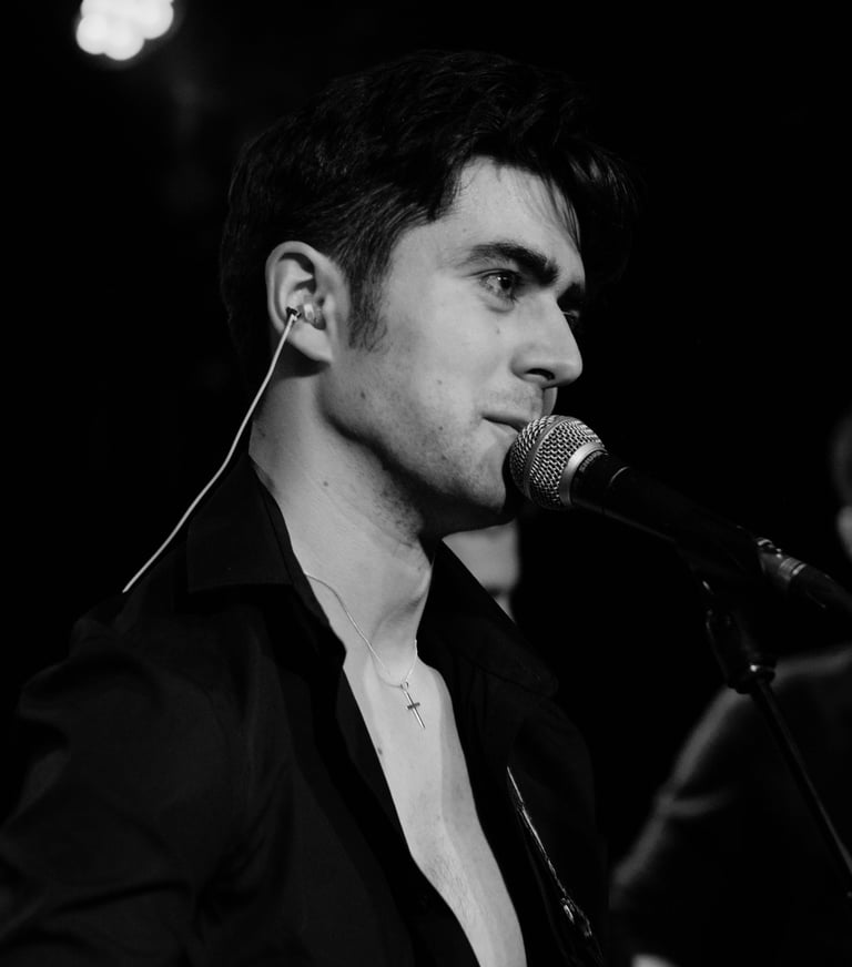 Brighton singer Olly Williams performing live music at venue