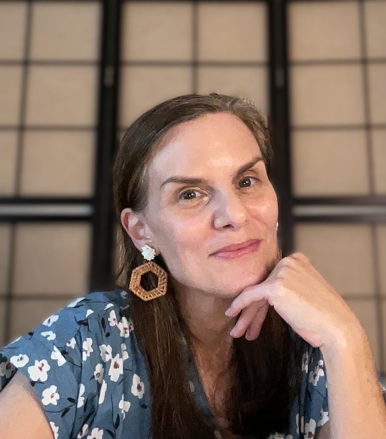 writer creator Amy A. DeCew office candid headshot