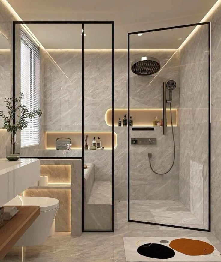 a bathroom with a shower and a bench