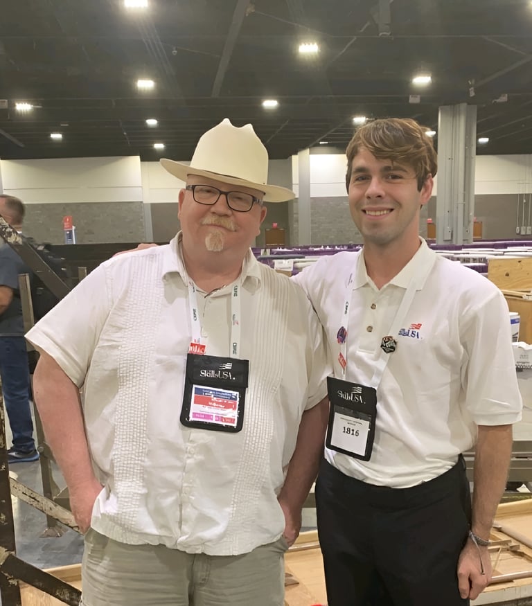 Ashton Geer standing next to Mike Myers the CompTIA Course Writer