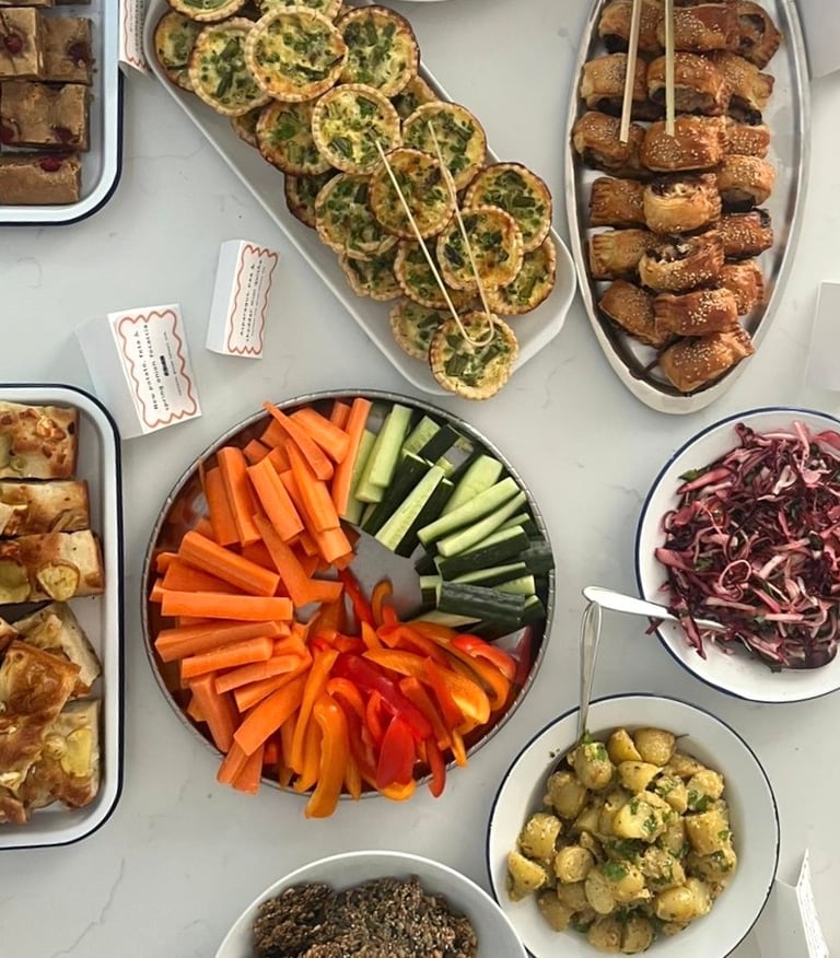 a table with a variety of buffet items