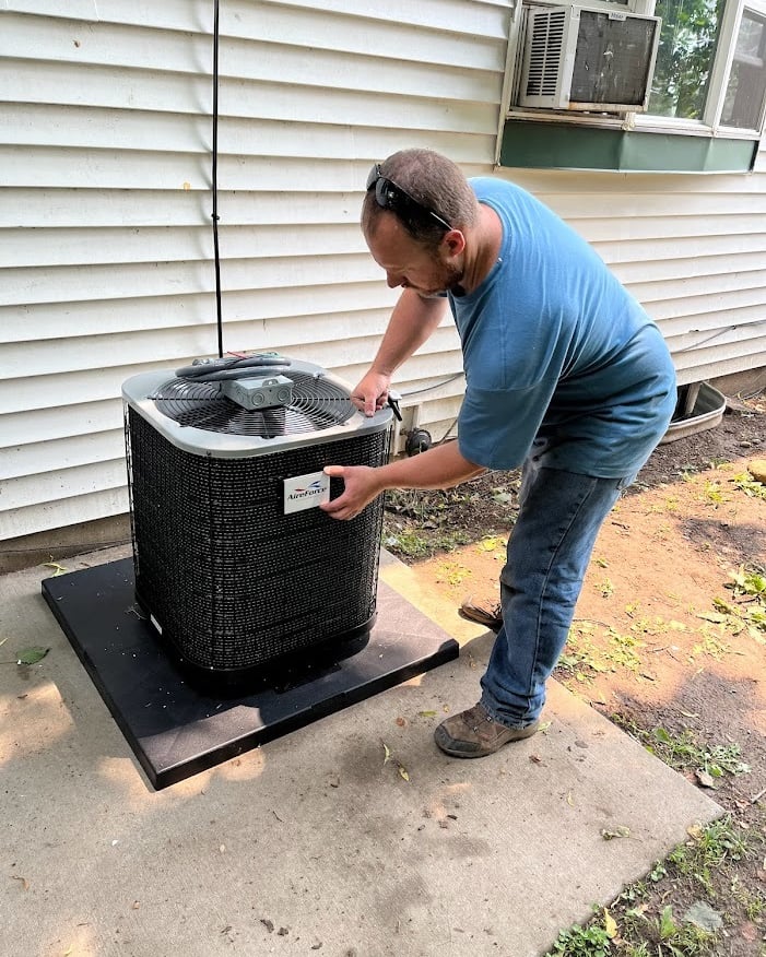 Owner, Dan, putting the final touches on the A/C install in Theresa, WI.