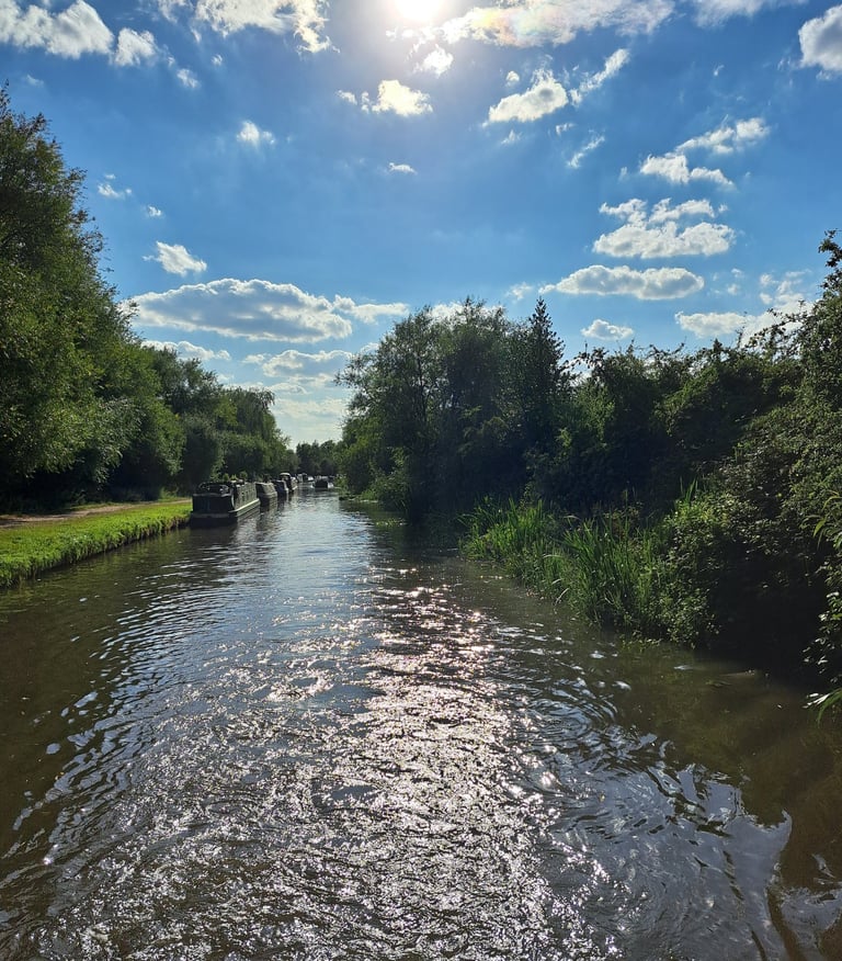 a boat traveling down a canal