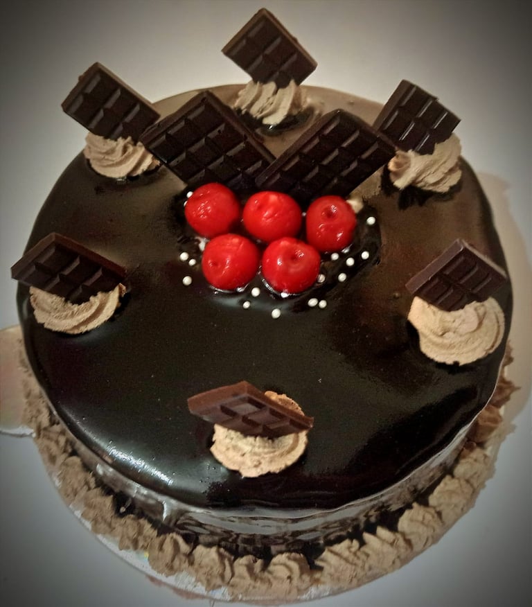 delicious chocolate cake and chocolate truffle cake at vyanjan bakers prayagraj