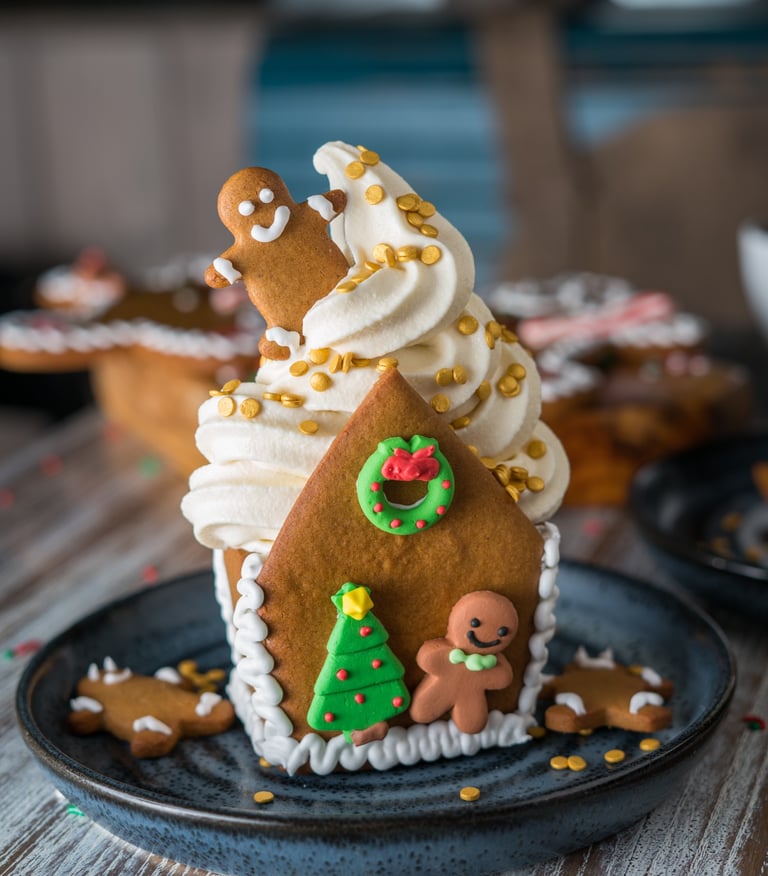 a gingerbread house with soft serve inside 