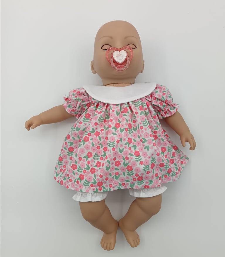 Zapf Baby Annabell doll in pink floral dress