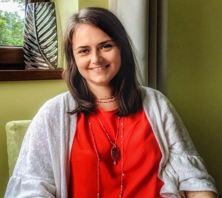 a woman in a red shirt