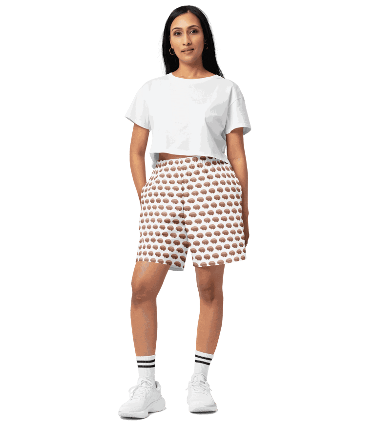 model wearing workout shorts with an all over print of a brain