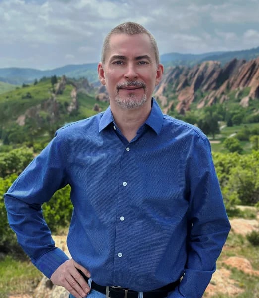 Christopher Wilson smiling, founder of Cilson Bookkeeping, Colorado