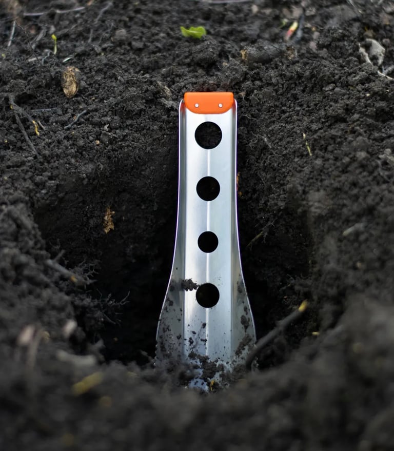 boglerco trowel in a cathole closeup