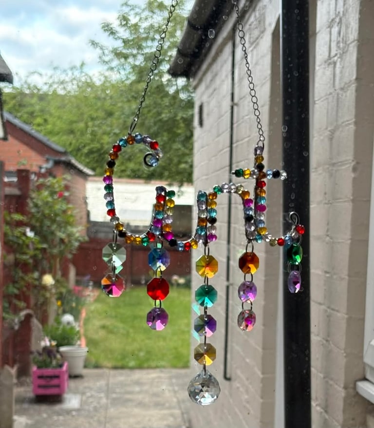 A Random Rainbow Cunt catcher in its new home with a fellow sweary business, Swears of Joy