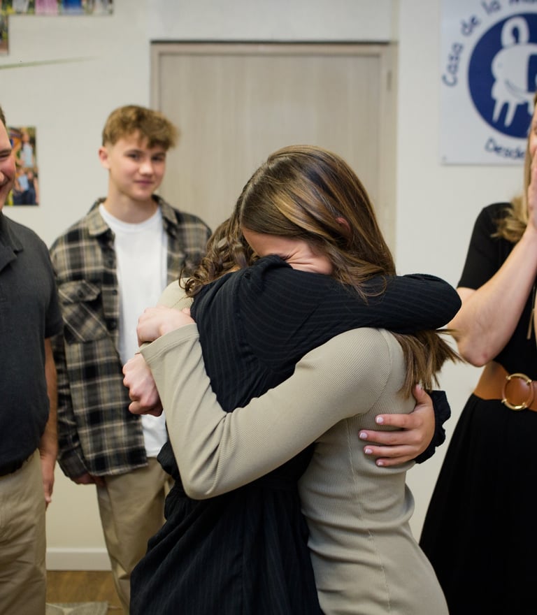 First embrace during an adoption journey in Colombia