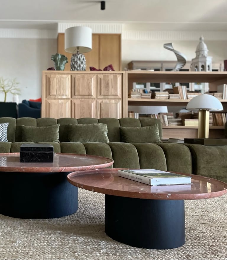 Lounge at Villa La Gratitud with curved sofas and contemporary finishes