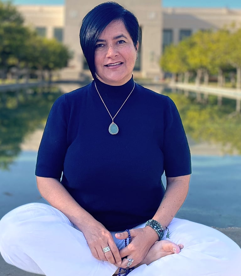 Raquel in a lotus pose, representing inner peace and emotional intelligence through RHM Life Coachin