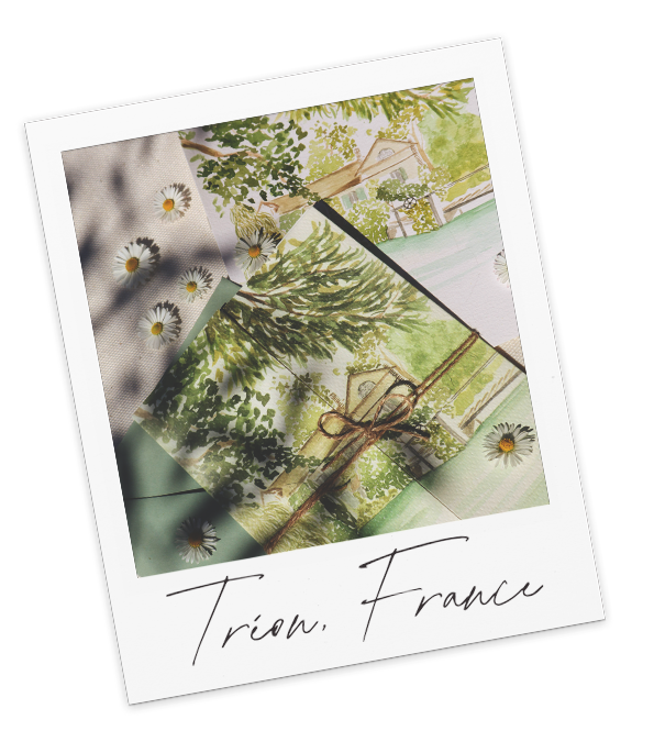 polaroid of a close up of a custom watercolor invitation for a country chic wedding in france