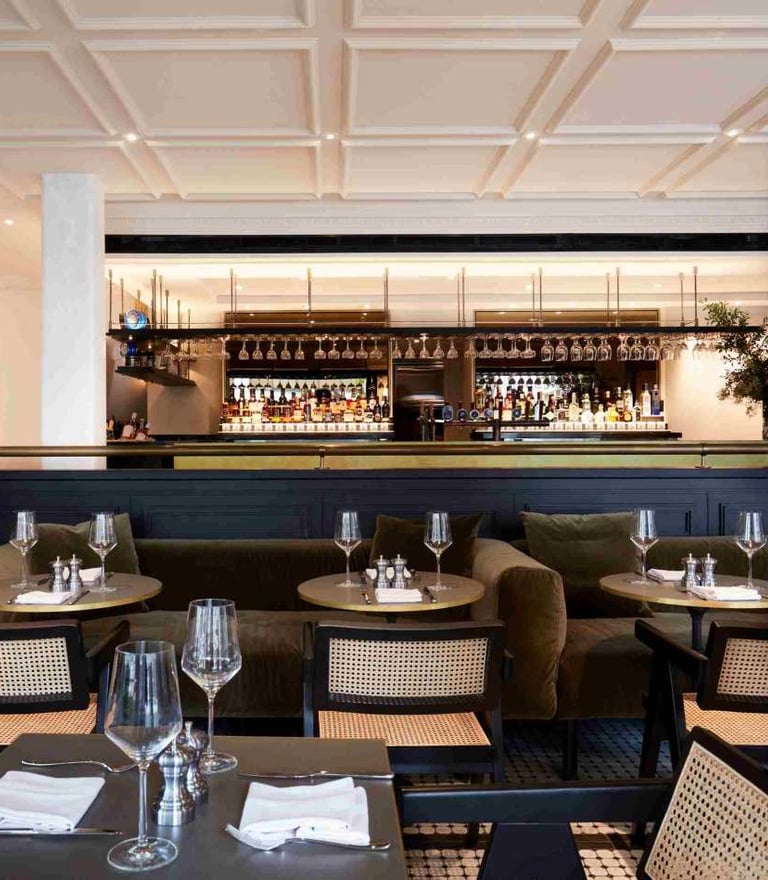 a restaurant with a bar and a bar with a bar