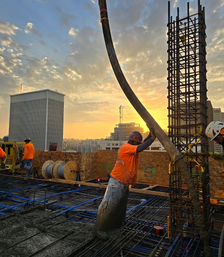 a man is working a large cement pump