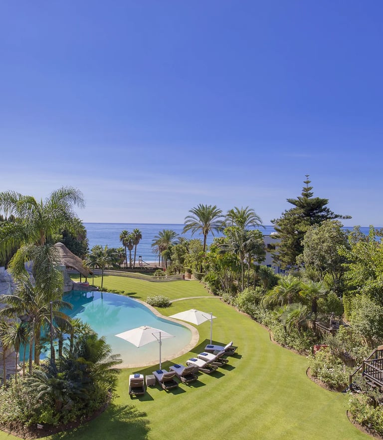Mediterranean gardens with direct beach access and sea views