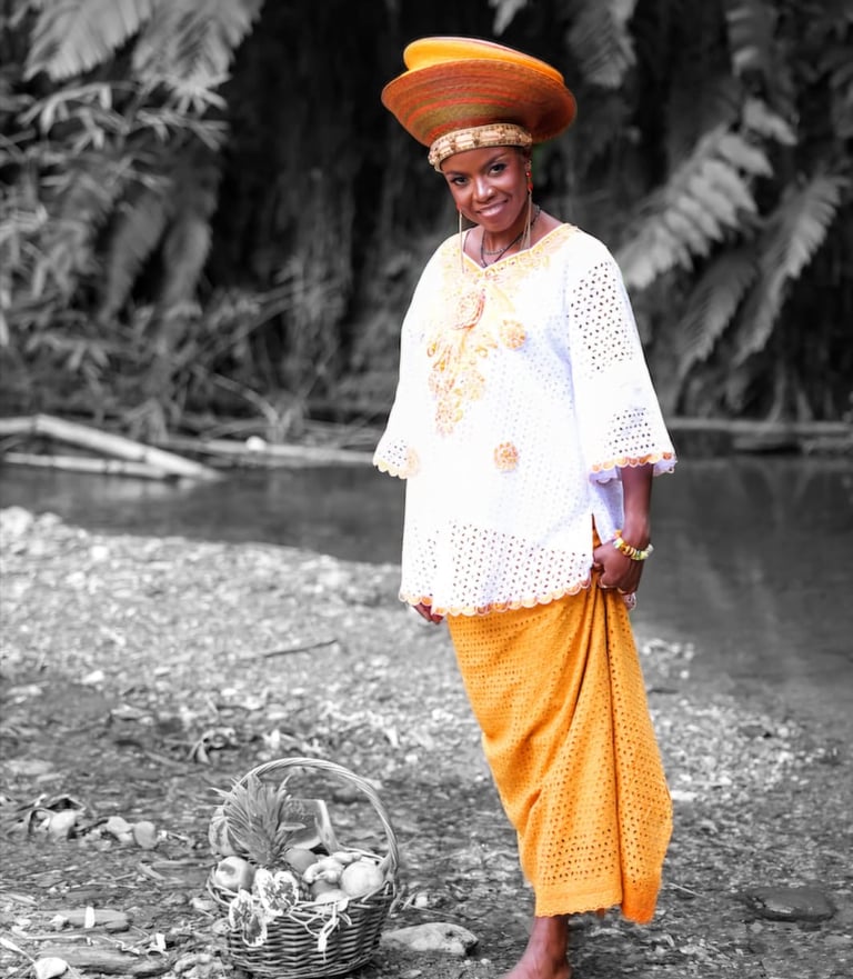 The Nutritionist in traditional African garb with a basket of fruits at a majestic river