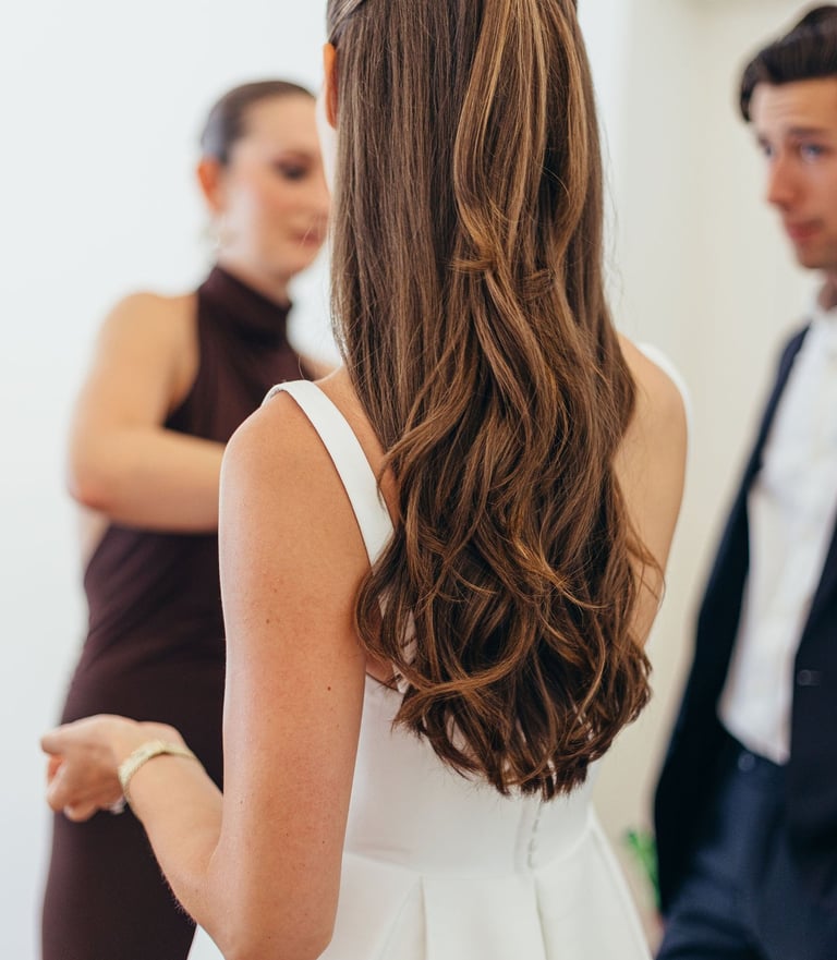 Beautiful long hair styled into half up half down hairstyle