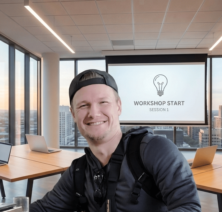 Smiling man in a modern office attending an innovation workshop session with city views.