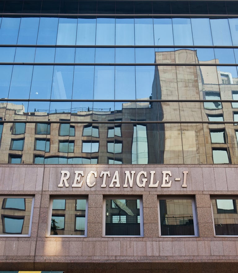 a building with a sign that says rectangle-1