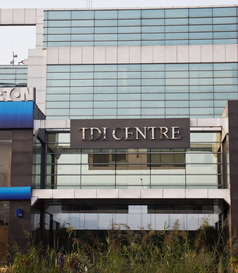 a building with a sign that says TDI Center