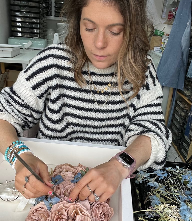 Jenny from Infinity Flowers expertly preserving a wedding bouquet