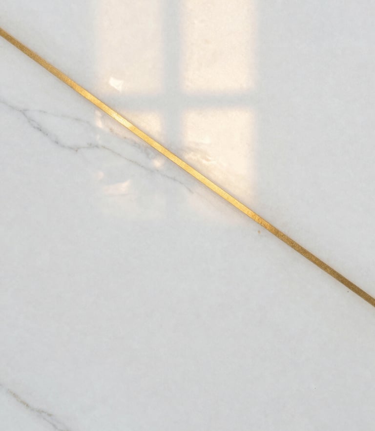 Extreme close-up of premium white alabaster marble with natural subtle grey veins, warm golden sunlight reflecting off the polished surface, editorial architectural detail.
