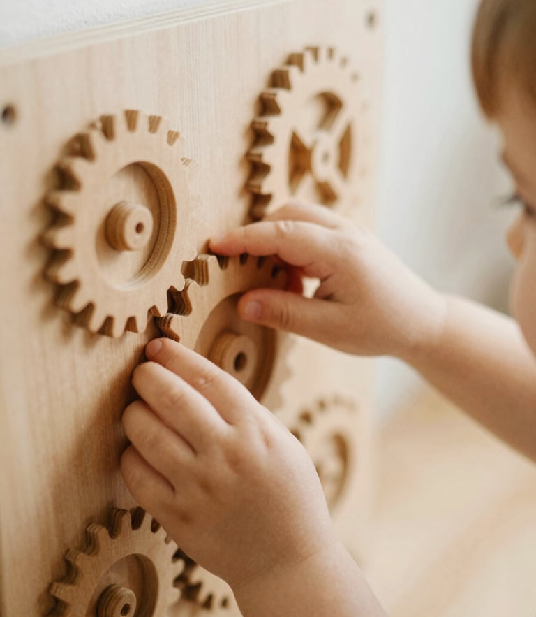A close-up shot of a child's hands gently exploring a wooden sensory tactile wall with textured gears, soft warm indoor lighting, shallow depth of field, 35mm