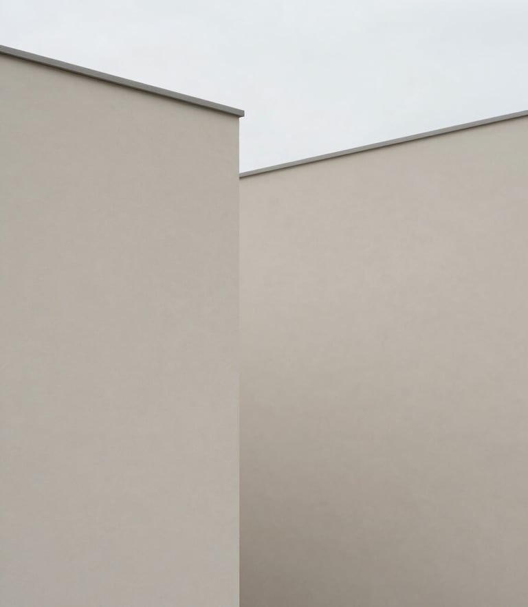 Minimalist editorial photography of clean architectural lines, soft overcast daylight, muted slate tones, geometric composition.
