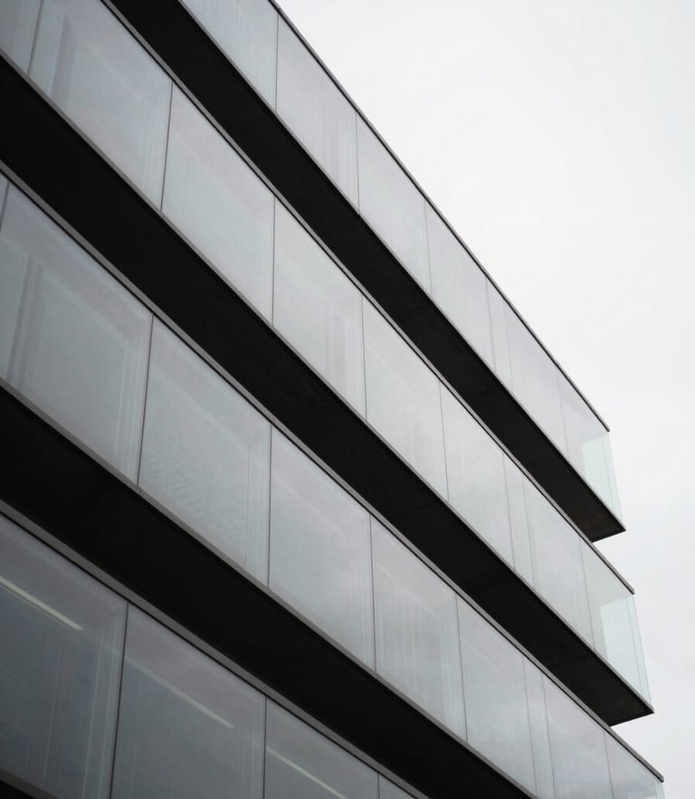 An abstract macro photograph of modern architectural glass panels in Nova Lima, sharp diagonal lines, deep shadows, soft overcast daylight, professional medium format.