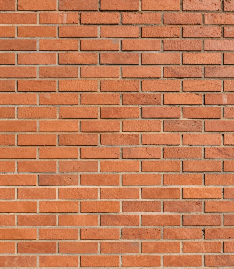 Straight eye-level architectural shot of raw Porotherm brickwork under bright morning sunlight, showing clean mortar lines and precise alignment, warm clay tones, architectural framing with negative space.