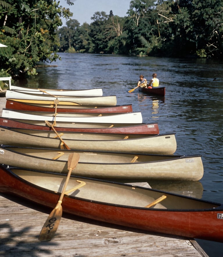 Vintage archival photo of canoes lined up on the wooden docks of the Ipswich River in 1955, warm nostalgic tones, family-owned heritage.