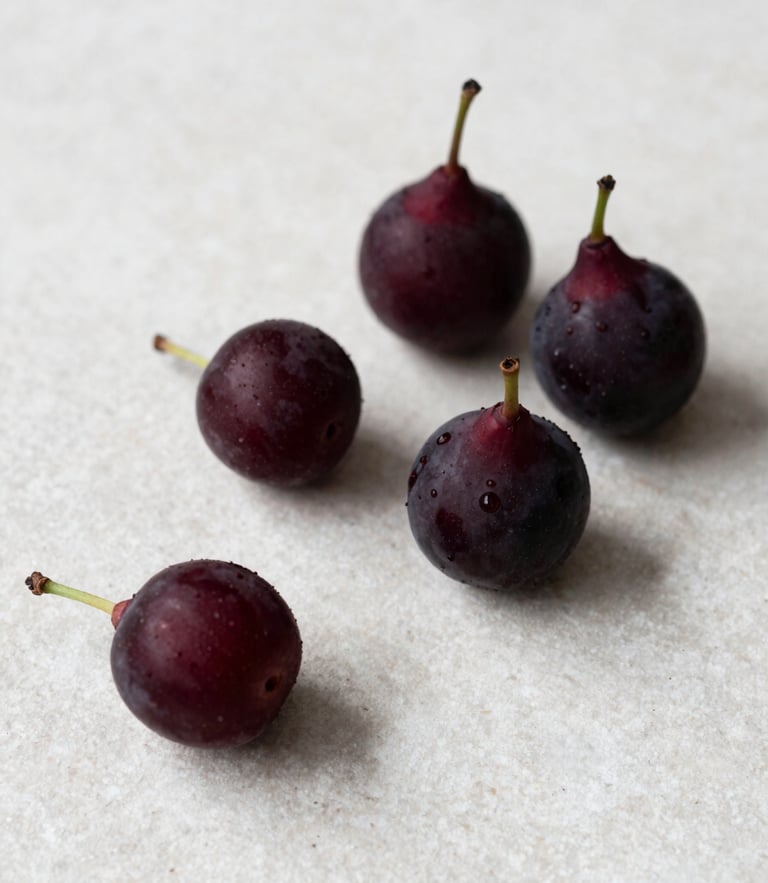 Minimalist Scandinavian food photography, raw organic ingredients on a clean light stone tabletop, soft natural side-light, high-contrast deep crimson tones, 35mm lens