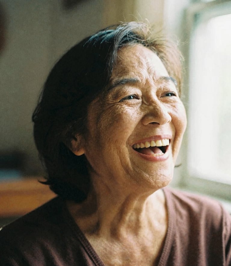 A warm close-up portrait of an active senior woman laughing in a sunlit room, soft natural window light, rich organic tones, shallow depth of field, 35mm film