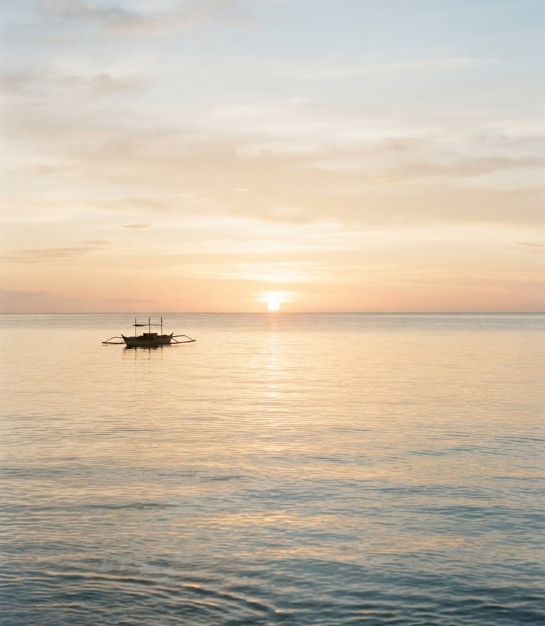 A serene coastal horizon at sunrise, soft golden light reflecting on calm ocean water, minimal composition, 35mm film