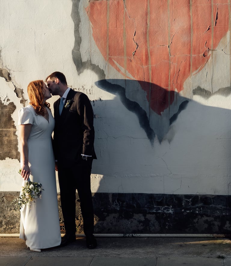 couple kissing by the sunset 