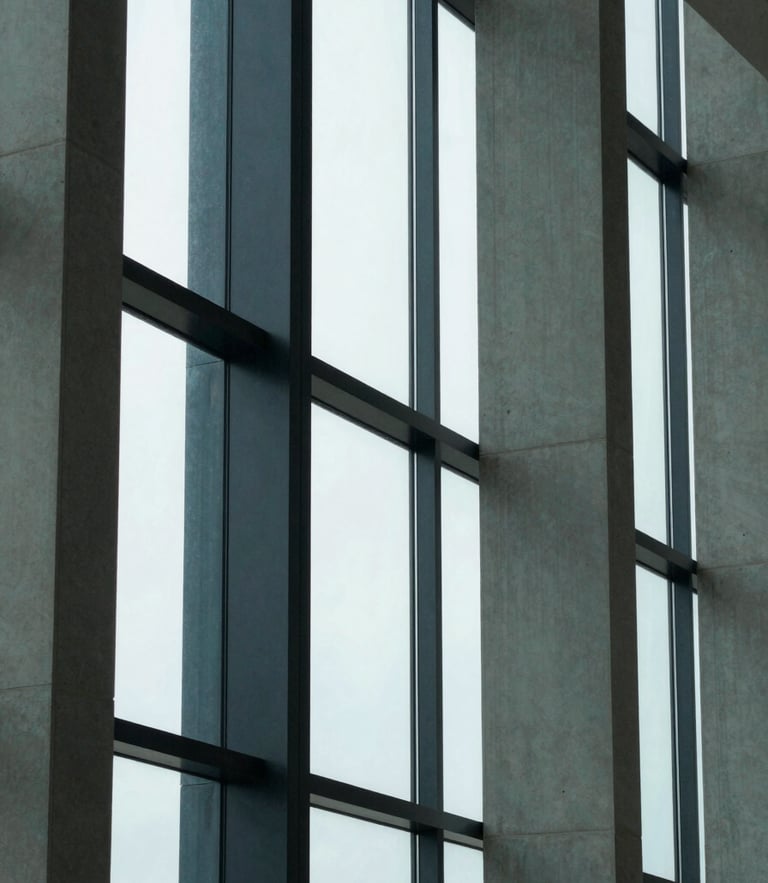 Abstract geometric patterns of concrete and glass architectural columns, sharp corporate daylight, cool tones, clean office window light, 35mm
