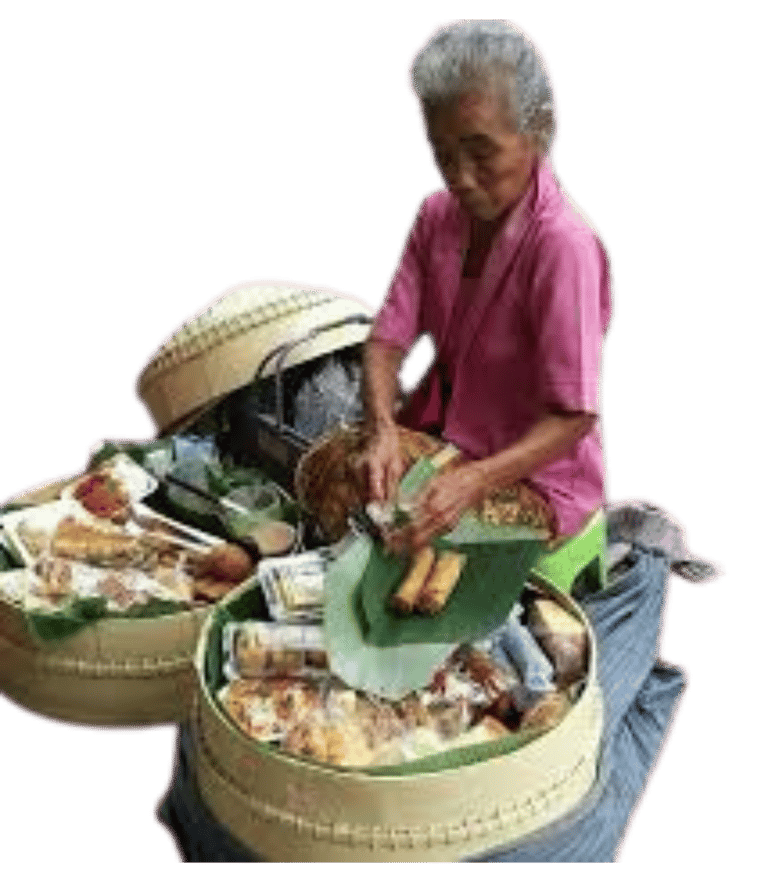 a woman sitting on a table with a basket of food
