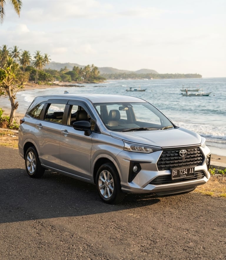 Eye-level three-quarter shot of a clean silver Toyota Avanza parked near Lasiana Beach under warm morning sunlight, professional automotive photography, 35mm lens