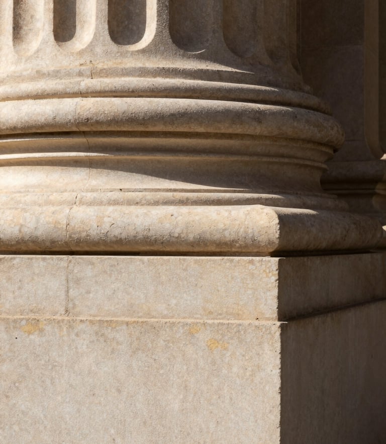 Macro close-up of an elegant limestone column corner, warm natural daylight, deep shadows, architectural stability, 35mm