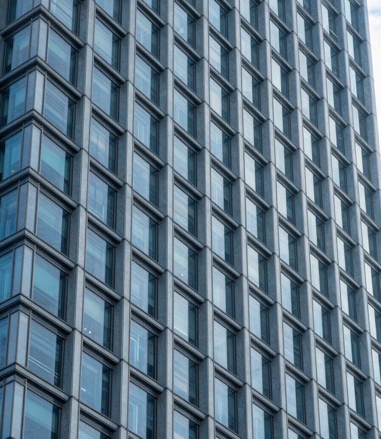 Abstract architectural lines of a modern corporate skyscraper facade, cool blue daylight, crisp sharp angles, minimal composition.
