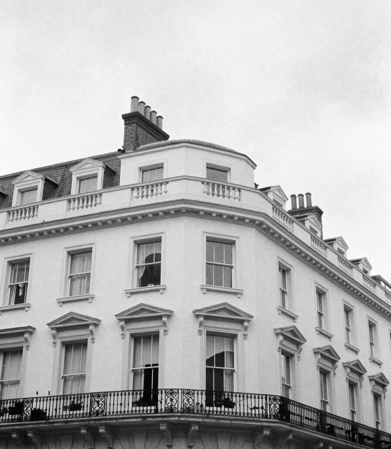 High-contrast editorial black and white photograph of Silverstream House architectural lines in Fitzrovia, soft overcast London daylight, 35mm film