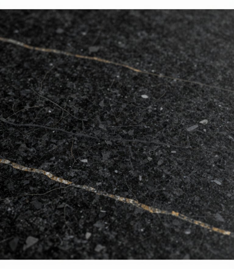A close-up, high-resolution shot of a luxury black granite slab with subtle gold and white veins, reflecting soft studio lighting. Minimalist and exclusive aesthetic, incorporating the brand colors #0D0D0D and #A18A6A.